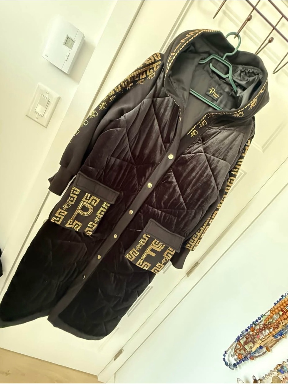 paparazzi Black Quilted Hooded Long Coat with Gold Accent Trim